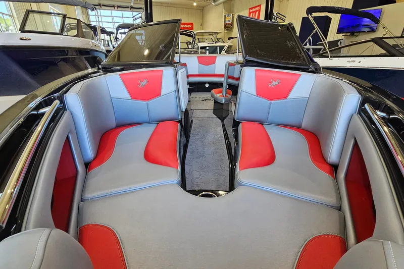 Slide: The Image of Interior of 2017 Gekko Revo 7.1 boat with red and gray seating. - 18