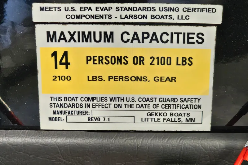 Slide: The Image of Boat capacity label for Gekko Revo 7.1, 2017, indicating 14 persons or 2100 lbs. - 23