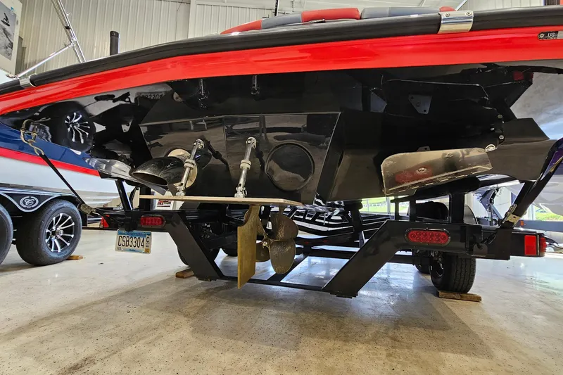 Slide: The Image of Rear view of a 2017 Gekko Revo 7.1 boat on a trailer in a garage. - 6