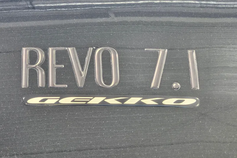 Slide: The Image of 2017 Gekko Revo 7.1 logo on a dark metallic surface. - 7