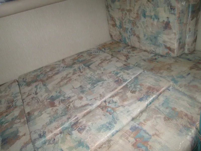 Slide: The Image of Interior of 1996 Sea Ray 290 Sundancer with patterned upholstery. - 21