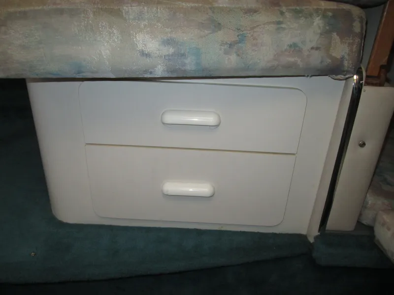 Slide: The Image of Interior of 1996 Sea Ray 290 Sundancer with drawers. - 26