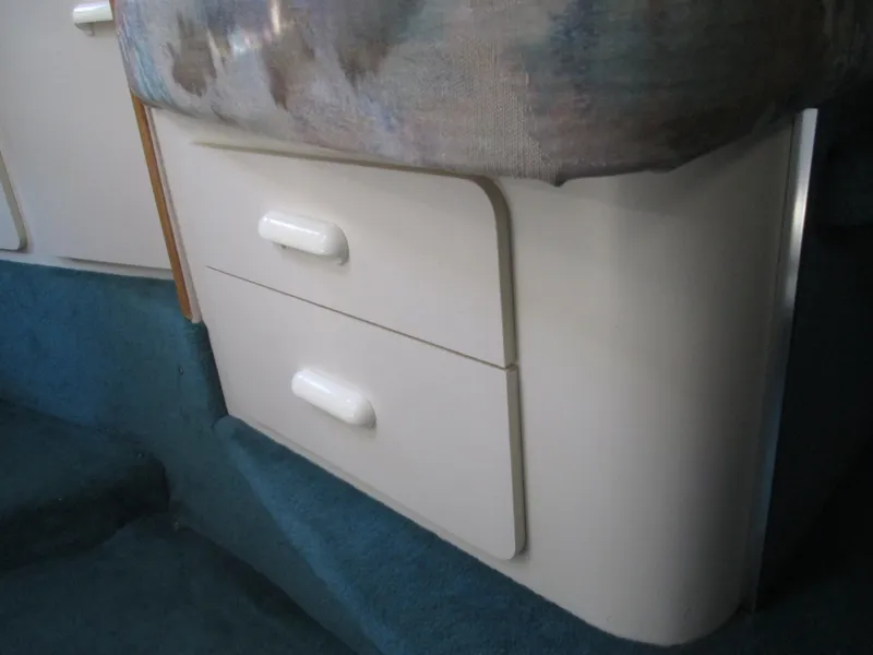 Slide: The Image of Interior of 1996 Sea Ray 290 Sundancer with drawers. - 27