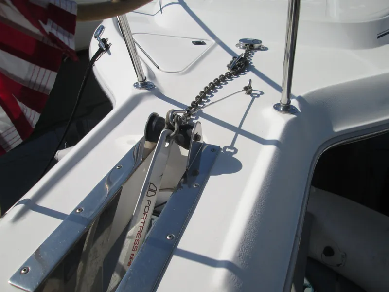 Slide: The Image of Anchor windlass on a 1996 Sea Ray 290 Sundancer boat. - 3