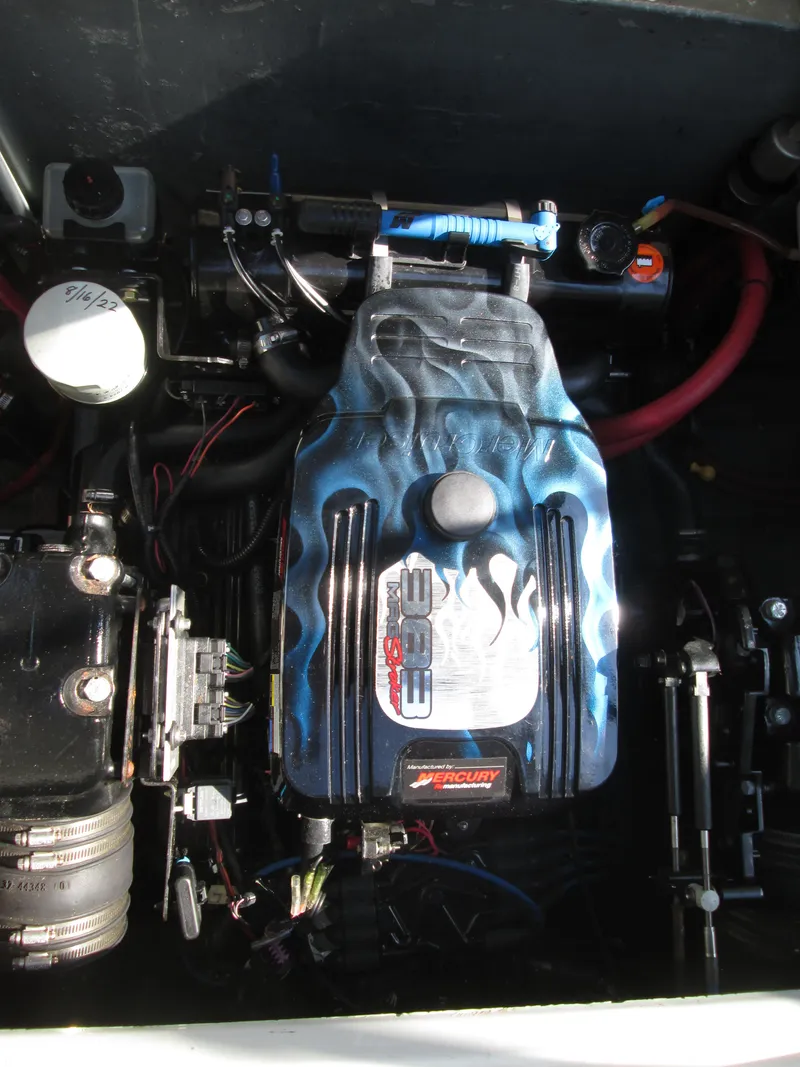 Slide: The Image of Engine compartment of a 1996 Sea Ray 290 Sundancer boat. - 33