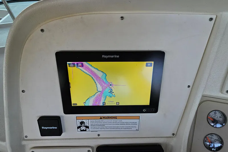 Slide: The Image of Raymarine navigation display on 1996 Cruisers Yachts 3570 Esprit dashboard. - 13