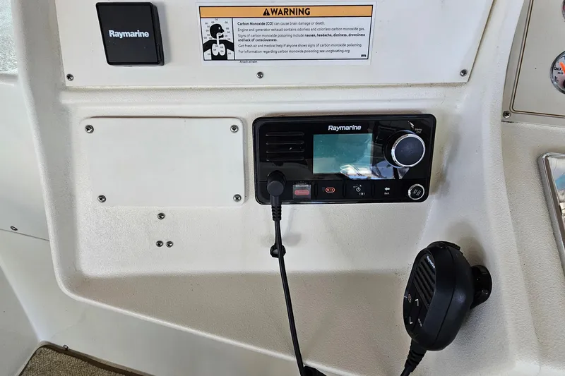 Slide: The Image of Control panel of a 1996 Cruisers Yachts 3570 Esprit with Raymarine equipment. - 14