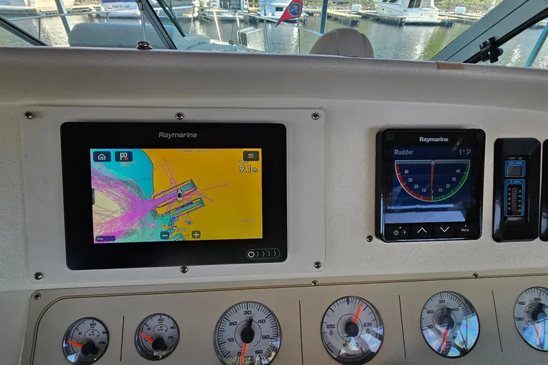 Slide: The Image of Helm of 1996 Cruisers Yachts 3570 Esprit with Raymarine navigation displays and gauges. - 15