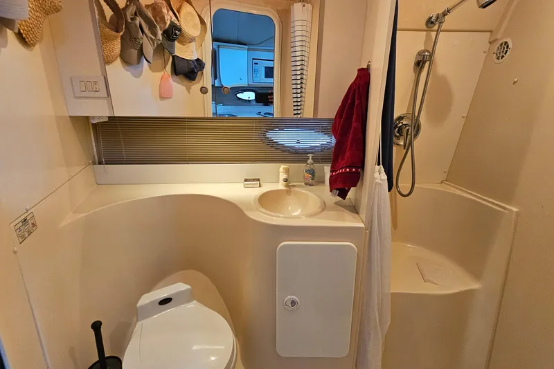 Slide: The Image of Bathroom interior of 1996 Cruisers Yachts 3570 Esprit with shower and sink. - 24