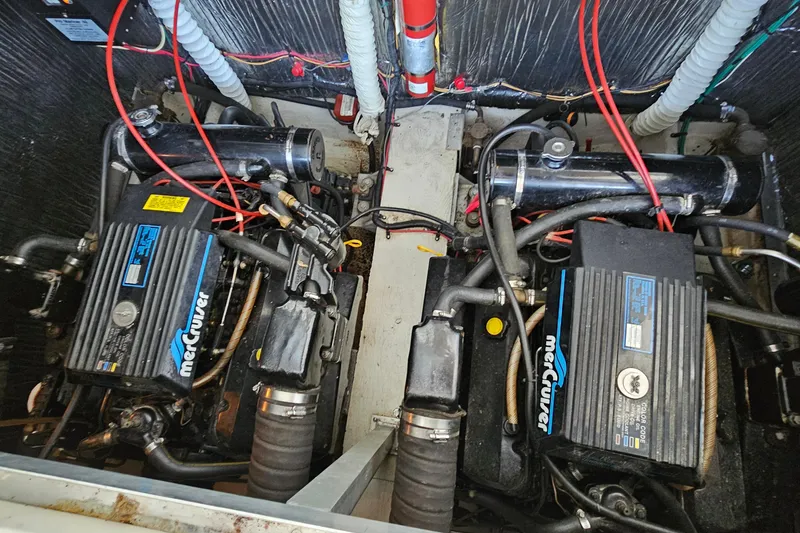 Slide: The Image of Engine compartment of a 1996 Cruisers Yachts 3570 Esprit with twin MerCruiser engines. - 28