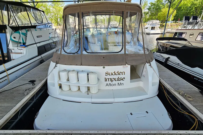Slide: The Image of 1996 Cruisers Yachts 3570 Esprit docked, featuring "Sudden Impulse" name, Afton, MN. - 5