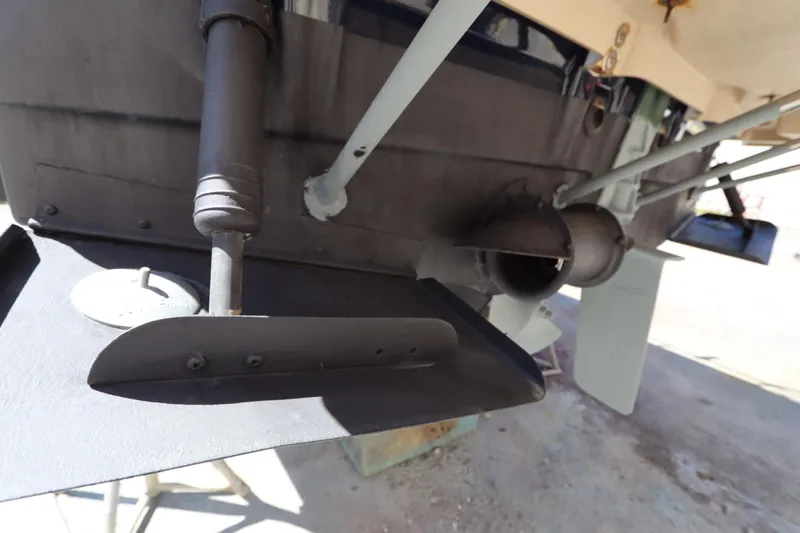 Slide: The Image of Close-up of 2015 Ranger Tugs R-27 boat's stern and propeller components. - 11