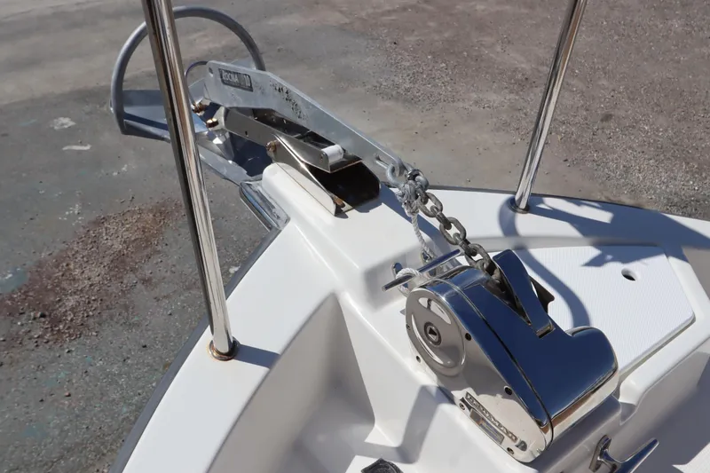 Slide: The Image of Anchor system on 2015 Ranger Tugs R-27 boat, featuring a polished metal finish. - 31