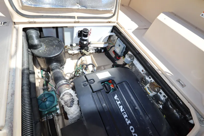 Slide: The Image of Engine compartment of a 2015 Ranger Tugs R-27 with Volvo Penta components. - 44