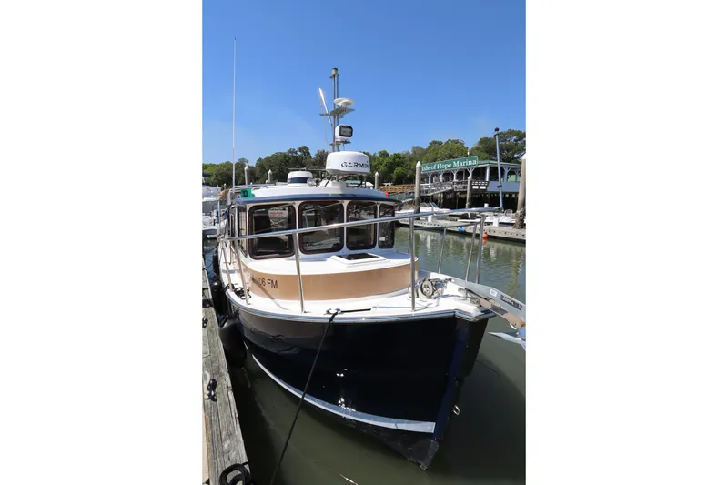 Slide: The Image of 2015 Ranger Tugs R-27 docked at Isle of Hope Marina. - 54