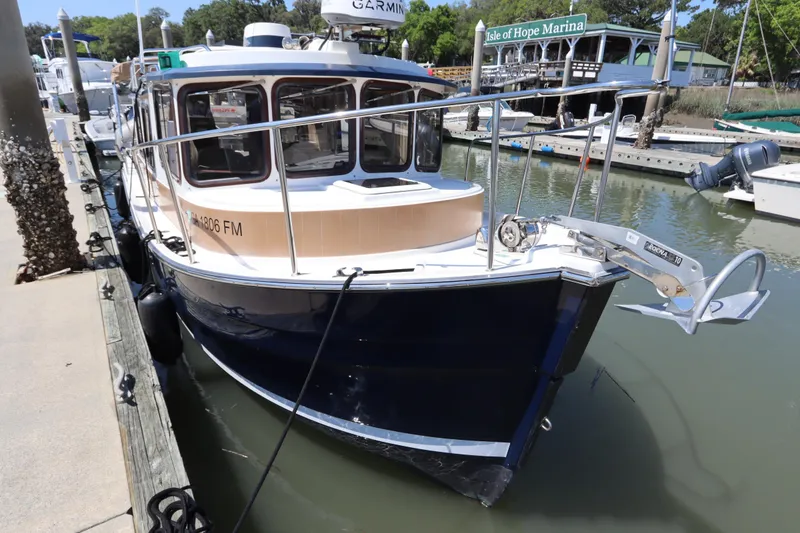 Slide: The Image of 2015 Ranger Tugs R-27 docked at Isle of Hope Marina. - 55