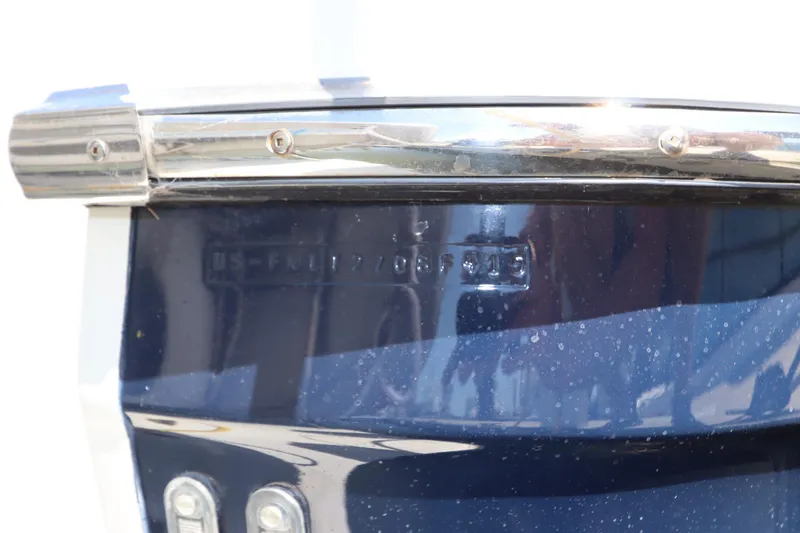 Slide: The Image of Close-up of a 2015 Ranger Tugs R-27 boat hull with identification number. - 58