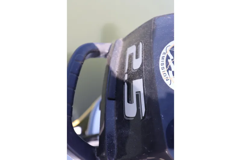 Slide: The Image of Close-up of a 2015 Ranger Tugs R-27 engine with "25" marking. - 60