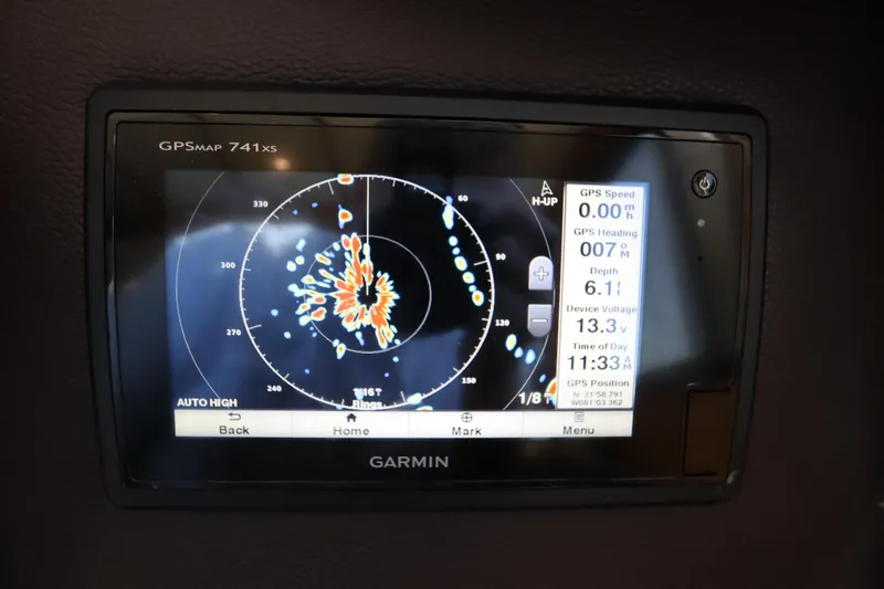 Slide: The Image of Garmin GPSMap 741xs display on 2015 Ranger Tugs R-27, showing navigation and depth data. - 82