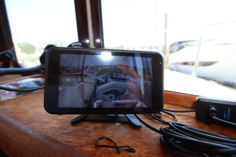 Slide: The Image of Display screen showing boat view inside 2015 Ranger Tugs R-27 cabin. - 85