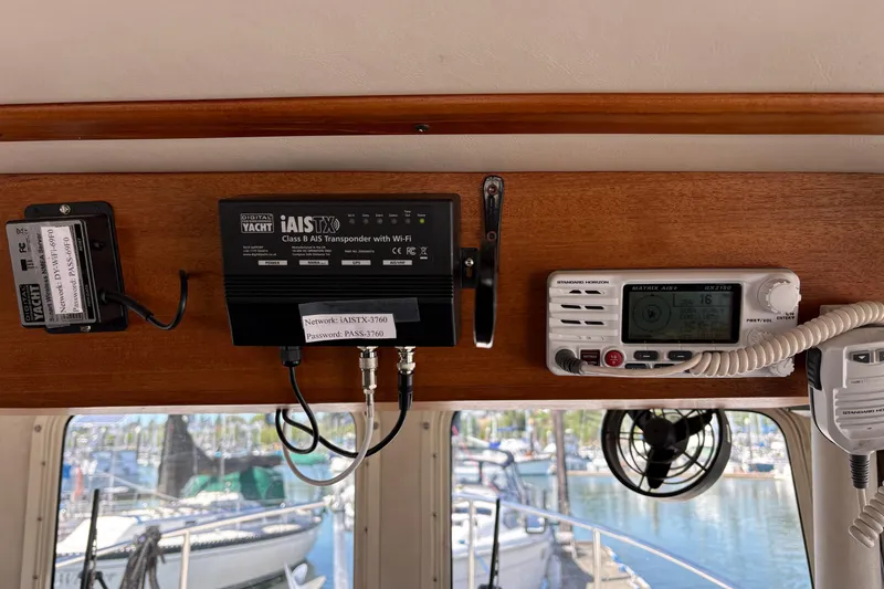 Slide: The Image of 2004 Nordic Tug 32 interior with AIS transponder and marine radio equipment. - 27
