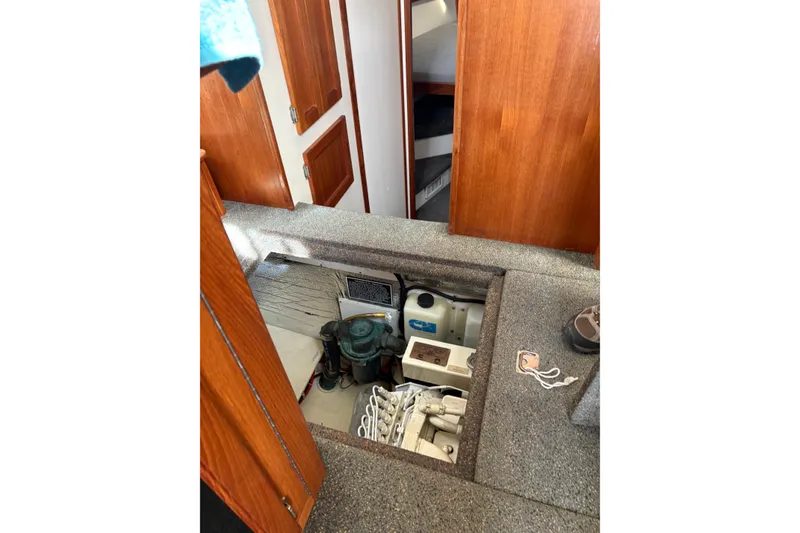 Slide: The Image of Interior of a 2004 Nordic Tug 32 with engine compartment. - 36