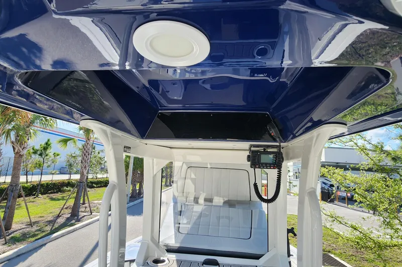 Slide: The Image of 2022 Yamaha 255 FSH Sport E boat interior, featuring sleek design and modern equipment. - 17