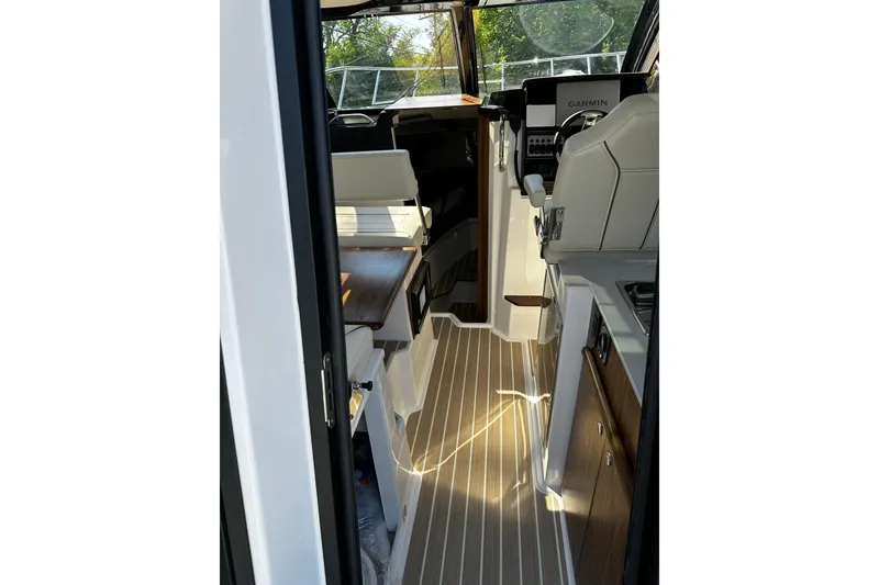 Slide: The Image of Interior view of 2026 Solara S-250 Coupe, featuring sleek design and modern controls. - 10