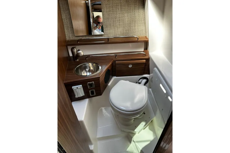 Slide: The Image of Compact bathroom in 2026 Solara S-250 Coupe with wood accents and modern fixtures. - 18