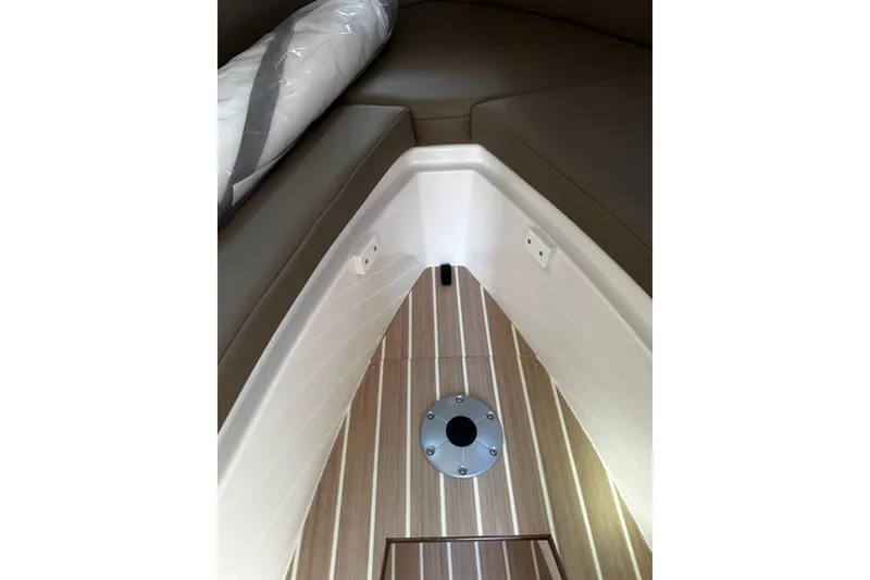 Slide: The Image of Interior view of 2026 Solara S-250 Coupe, featuring sleek seating and wood flooring. - 24