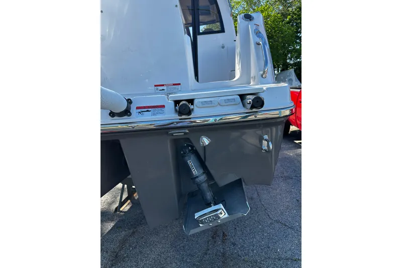 Slide: The Image of Rear view of 2026 Solara S-250 Coupe boat, showcasing engine and hull details. - 27