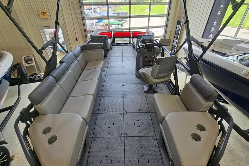 Slide: The Image of 2023 Sea-Doo Switch Cruise 21 interior with spacious seating and modern controls. - 5