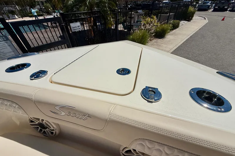 Slide: The Image of 2026 Scout 260 LXF boat deck with sleek design and chrome fittings. - 13