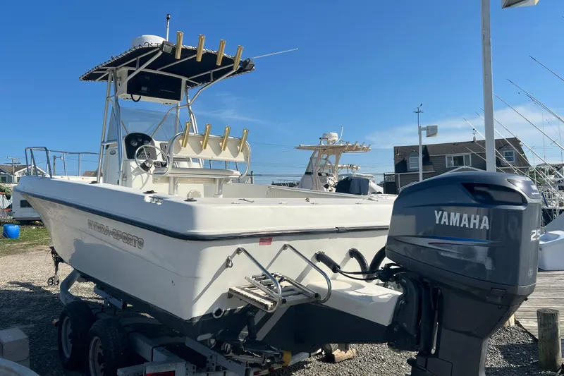 Slide: The Image of 2000 Hydra-Sports 230 Seahorse CC boat with Yamaha engine on trailer. - 4