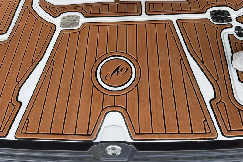 Slide: The Image of Teak-style deck flooring on a 2016 Monterey 258SS Super Sport boat. - 35