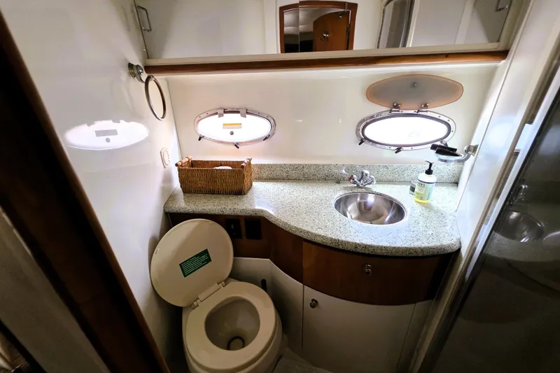 Slide: The Image of Bathroom interior of 2001 Carver 396 Aft Cabin Motor Yacht with sink and toilet. - 14