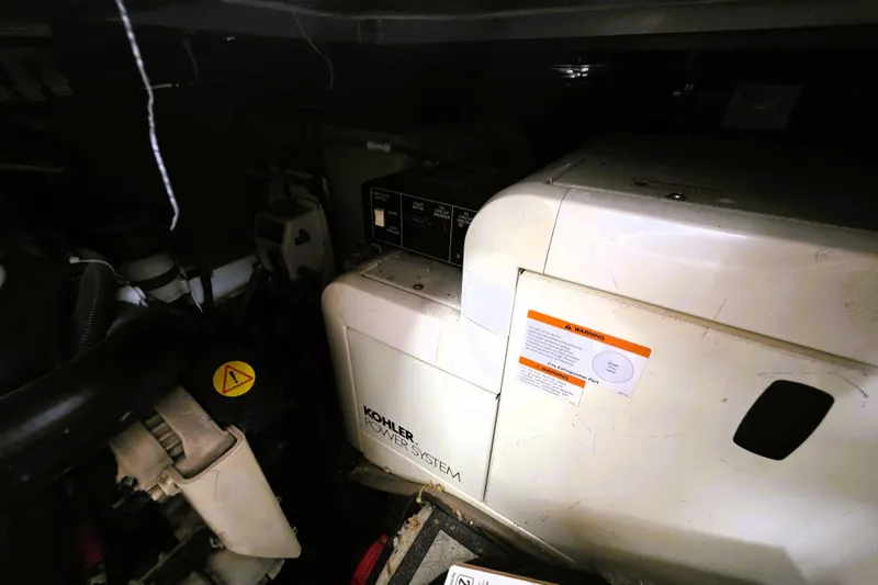 Slide: The Image of Engine room of 2001 Carver 396 Aft Cabin Motor Yacht with Kohler power system. - 24