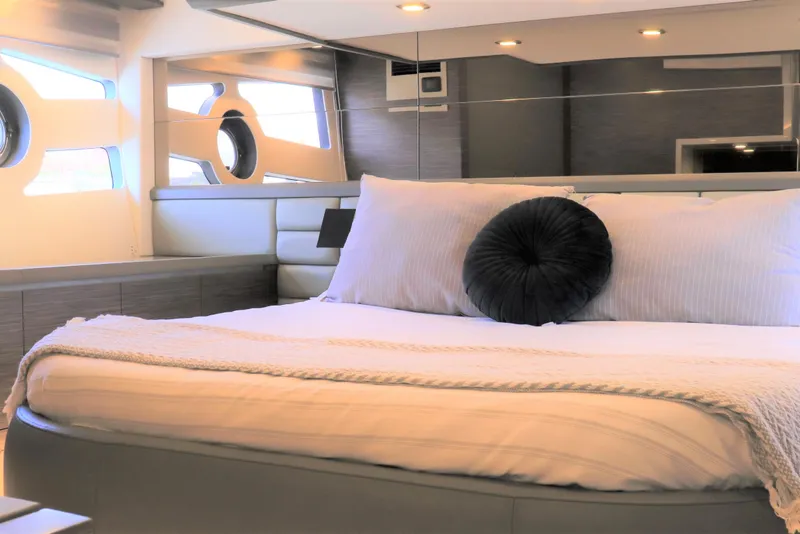 Slide: The Image of Luxurious bedroom interior of 2026 Cobrey 52 HT yacht with modern design. - 11