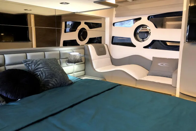 Slide: The Image of Luxurious interior of 2026 Cobrey 52 HT yacht with modern seating and stylish decor. - 12