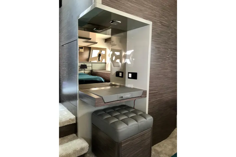 Slide: The Image of Luxurious interior of 2026 Cobrey 52 HT yacht with modern vanity and seating. - 14