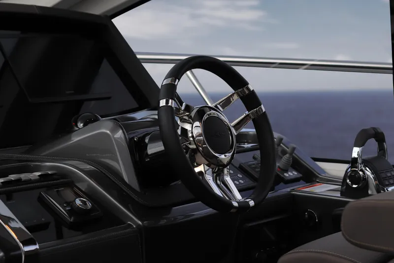 Slide: The Image of Luxurious helm of 2026 Cobrey 52 HT yacht with ocean view. - 4