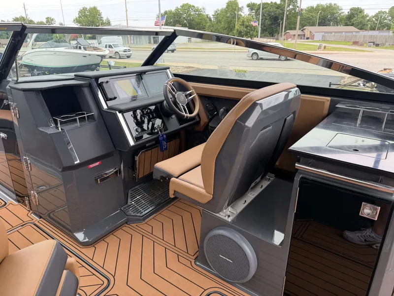 Slide: The Image of Interior of a 2026 Cobalt R33 boat with modern cockpit design. - 15
