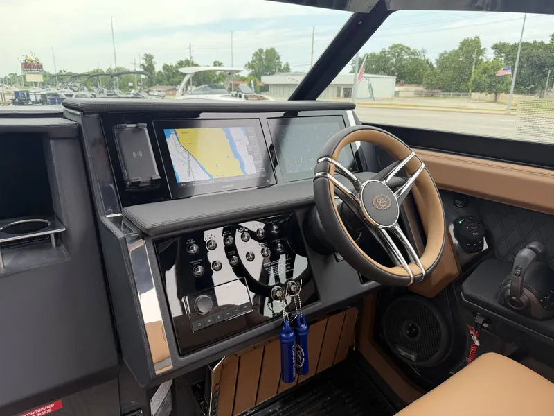 Slide: The Image of Interior of 2026 Cobalt R33 with modern steering wheel and navigation system. - 18