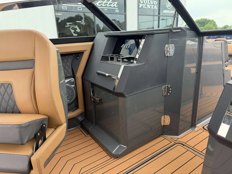 Slide: The Image of Interior of a 2026 Cobalt R33 boat with luxurious leather seating. - 20