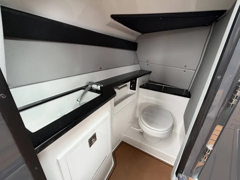 Slide: The Image of Interior of 2026 Cobalt R33 with toilet and sink. - 29