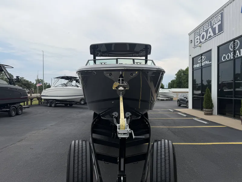 Slide: The Image of Cobalt R33 boat 2026 on trailer in front of sales building. - 3