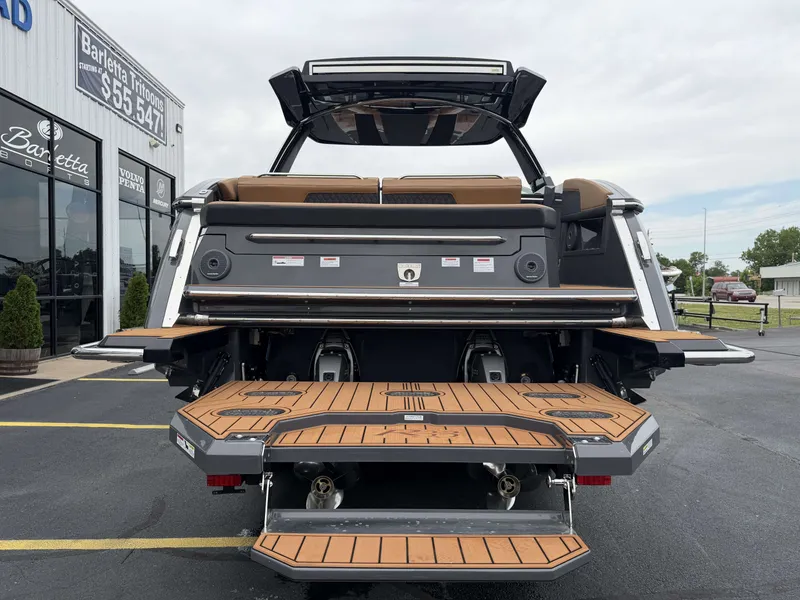 Slide: The Image of Rear view of Cobalt R33 boat, 2026 model, on a parking lot. - 7