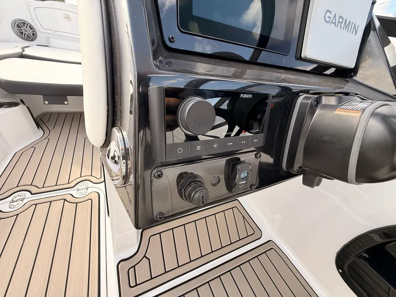 Slide: The Image of 2026 Stingray 23 OSX boat console with Garmin and Fusion system. - 31