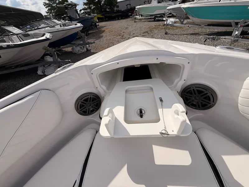 Slide: The Image of Interior view of 2026 Stingray 23 OSX boat with speakers. - 42