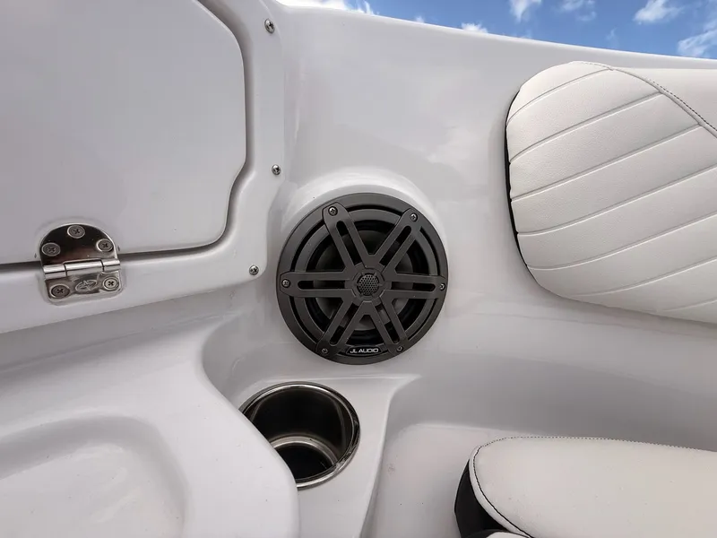 Slide: The Image of Speaker and seating in Stingray 23 OSX boat, model year 2026. - 43
